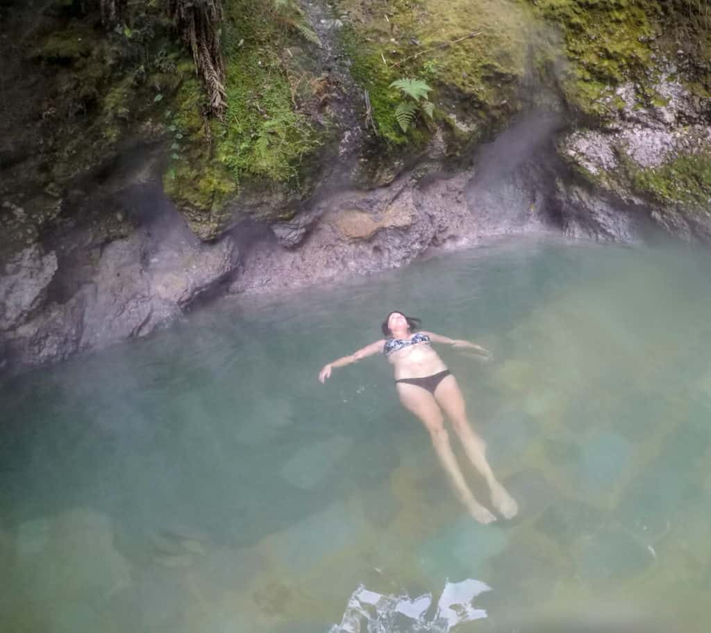 relaxing at fuentes georginas hot springs in xela guatemala