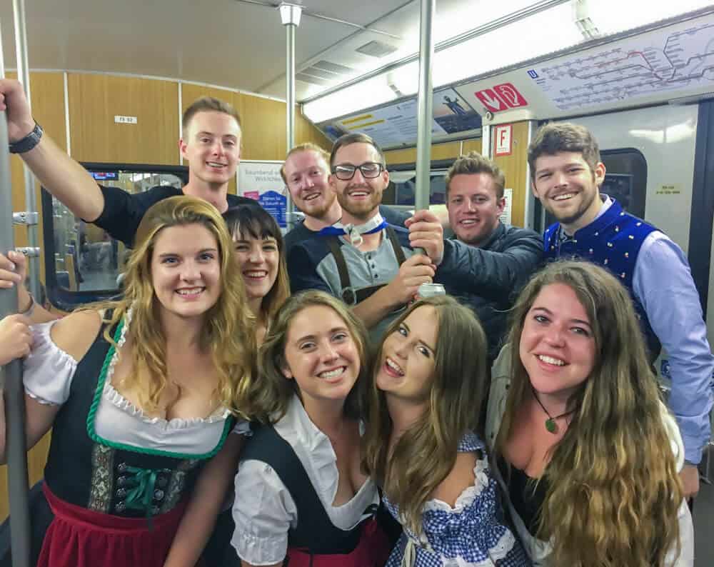 people on the subway going into Oktoberfest in munich