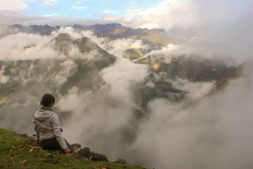 watching clouds pass over the mountains while hiking the inca trail