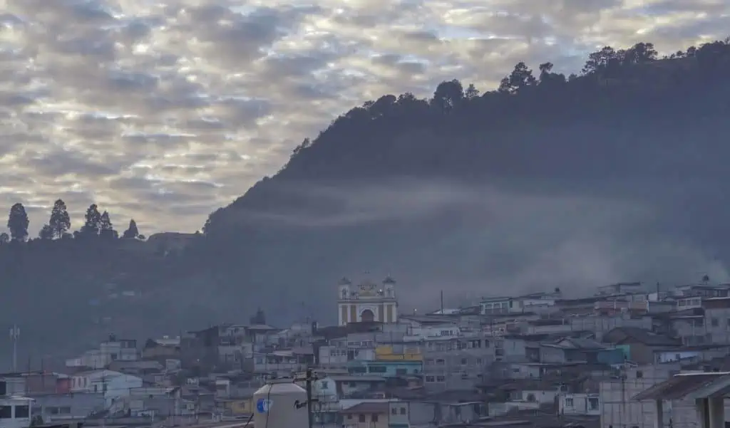 buildings with backdrop of mountains in xela guatemala