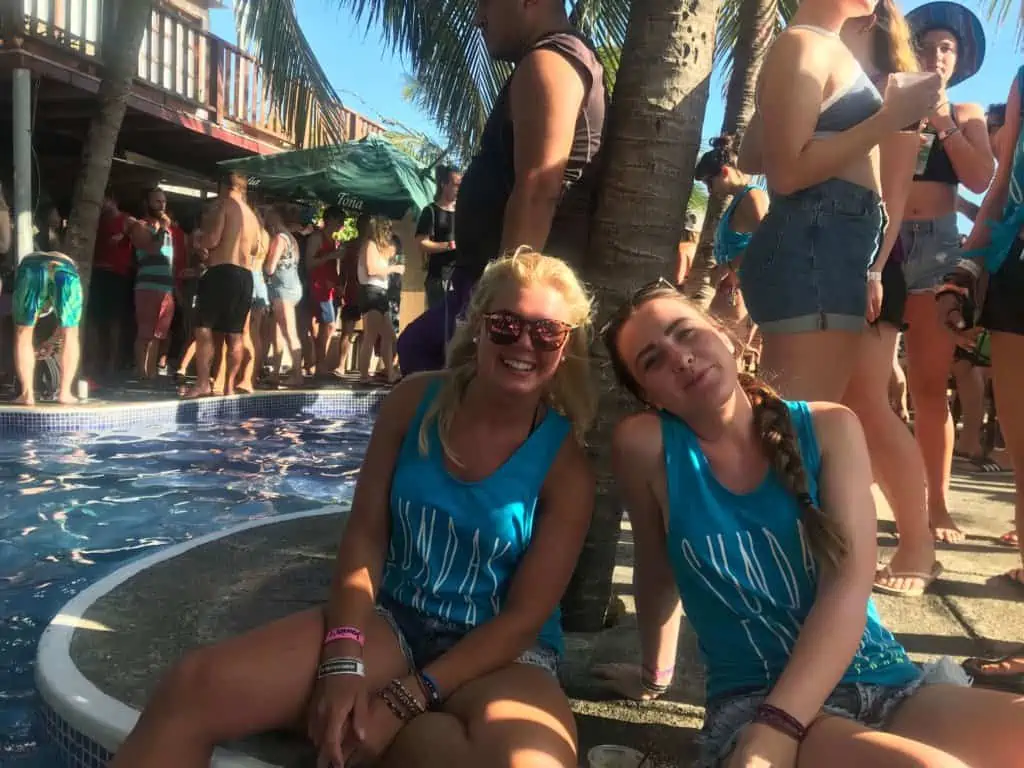 Two girls wearing the official Sunday Funday tank tops in Nicaragua