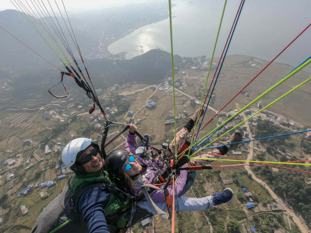 lora and instructor Paragliding in Pokhara, Nepal.