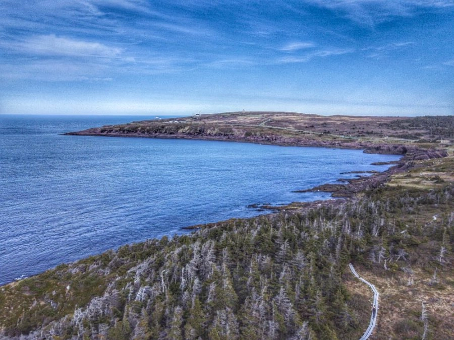 girl hiking on the east coast trail in cape spear newfoundland