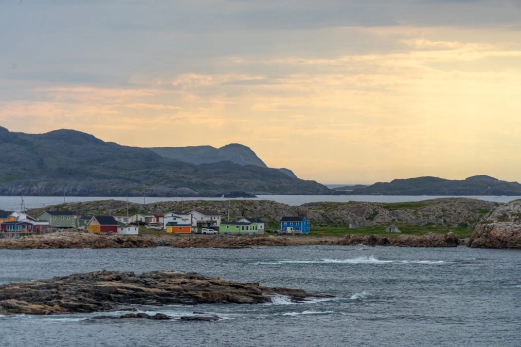 colorful houses in the community of joe batts arm on fogo island