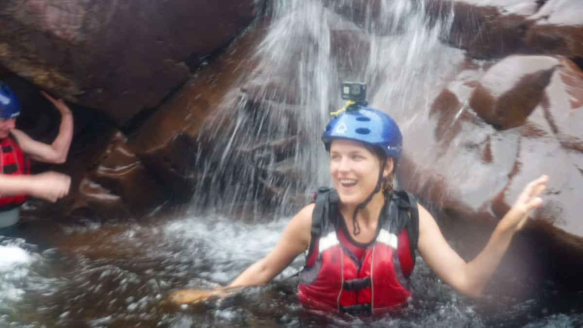 lora under waterfall in central newfoundland
