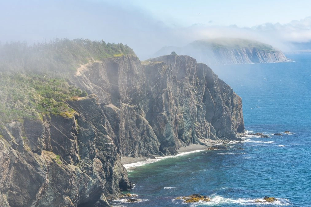 cliffs and atlantic ocean on the skerwink trail trinity newfoundlnad