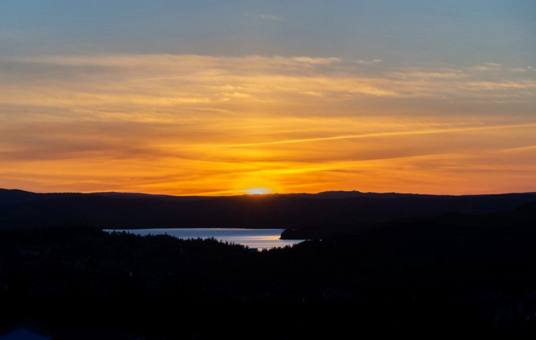 sunset over lake in witless bay