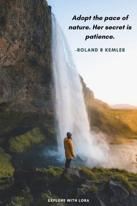 girl standing in front of waterfall with powerful waterfall quote written on it