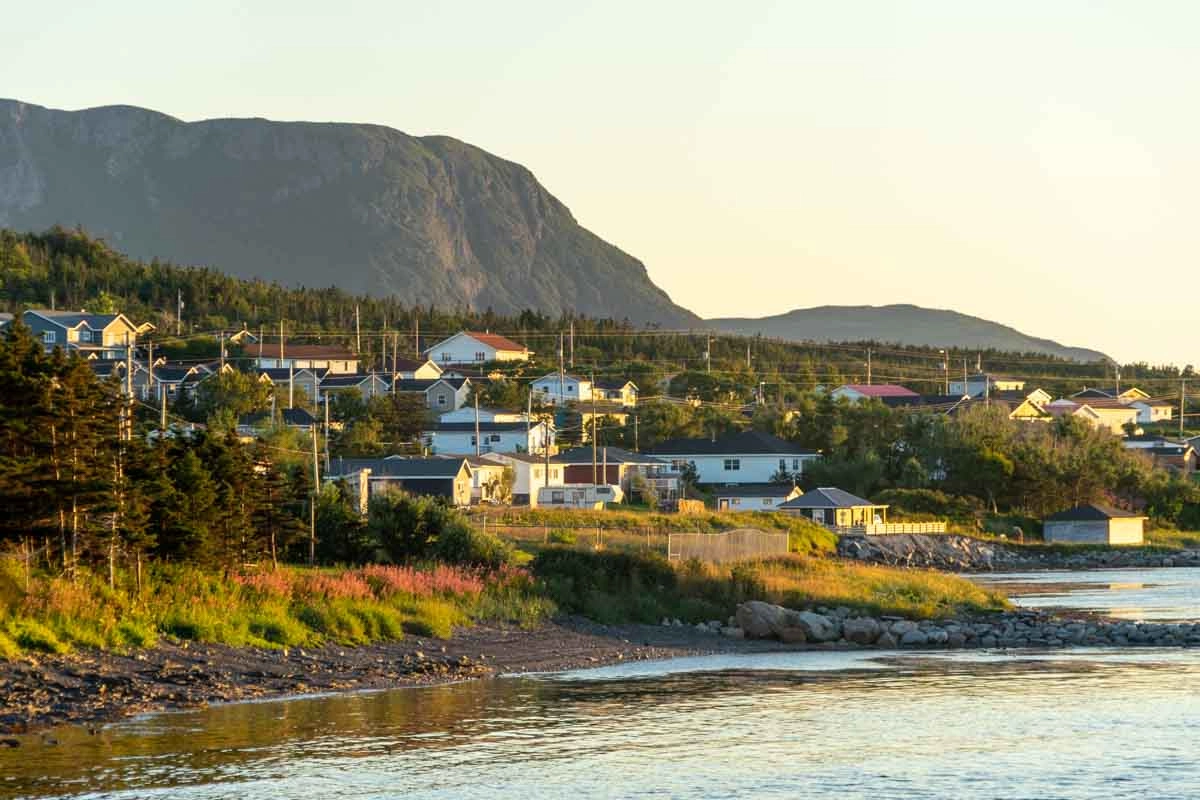 houses in rocky harbour at sunset