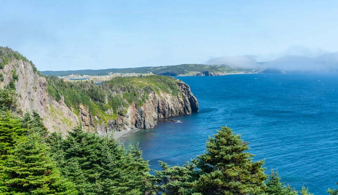 view of rugged cliffs against the atlantic ocean on the skerwink trail in newfoundland