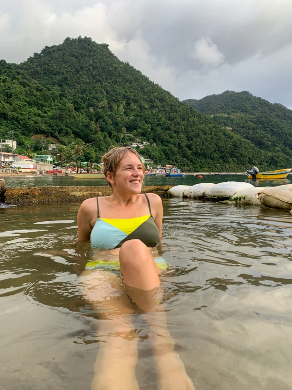 lora smiling while soaking in bubble beach spa dominica