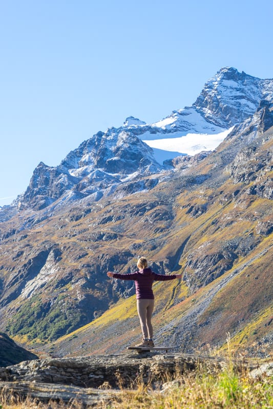 girl standing by mountains in austria