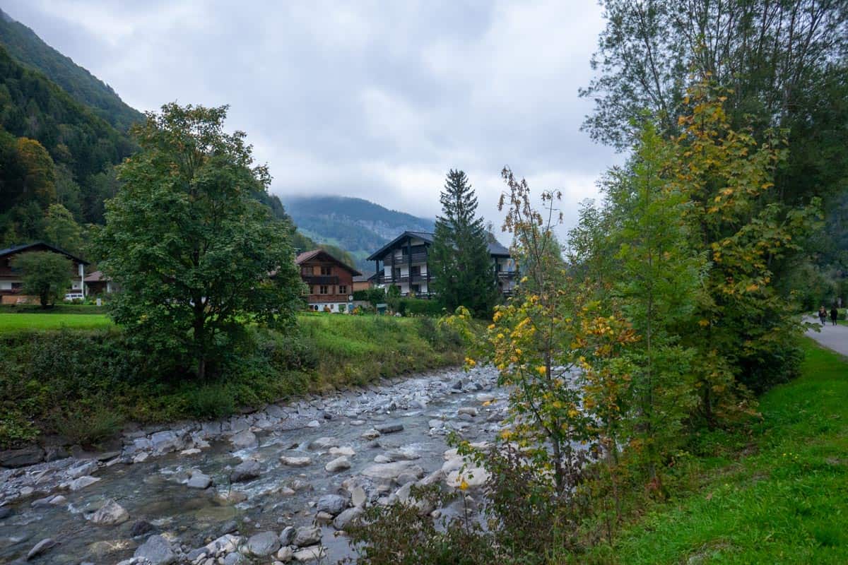 river flowing through town of mellau austria
