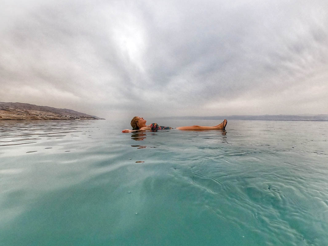 lora floating in the dead sea in jordan