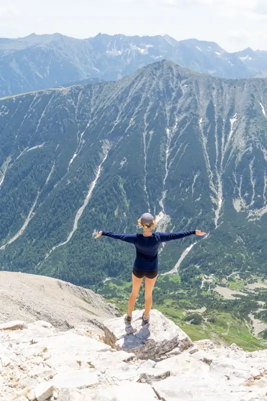 girl Hiking in the mountains near Bansko