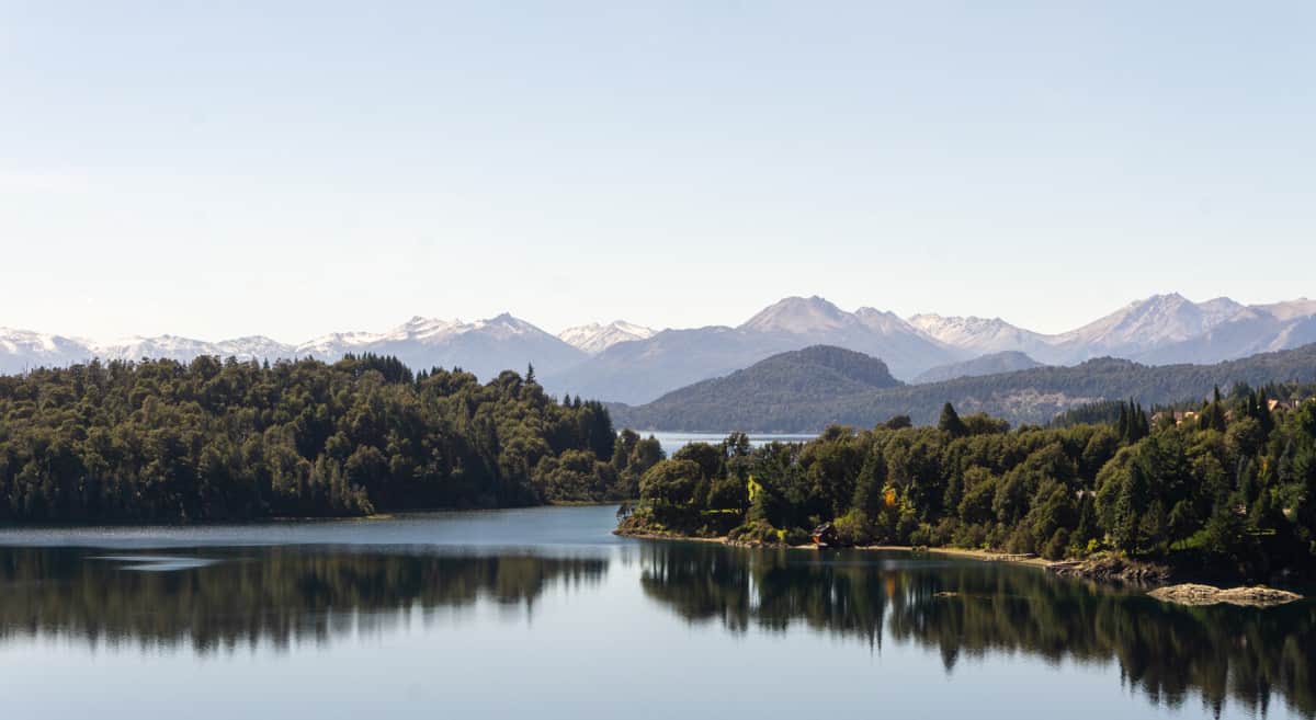 mountains reflecting in lake
