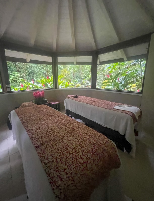 massage beds surrounded by rainforest