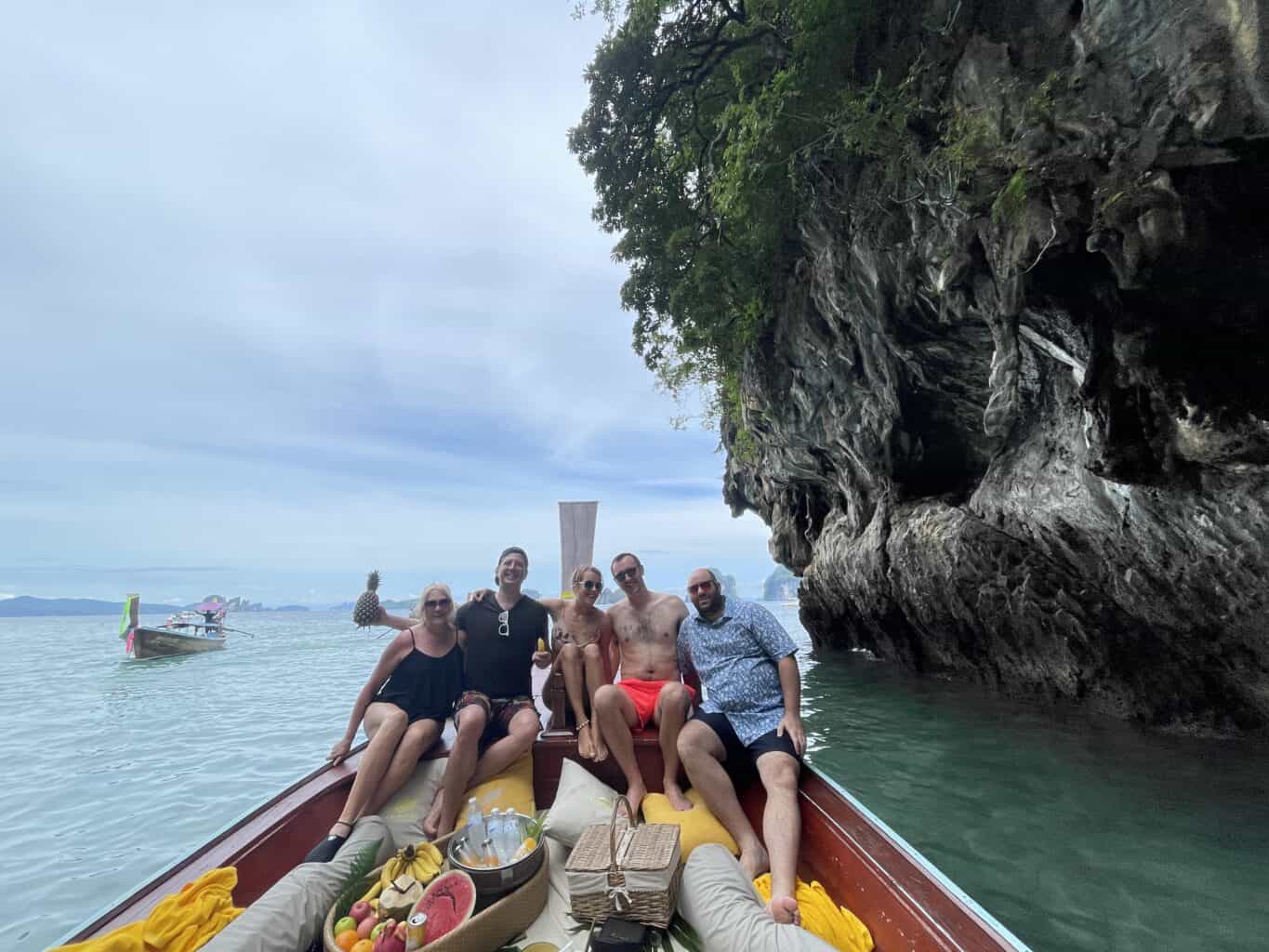 friends on a boat in krabi thailand