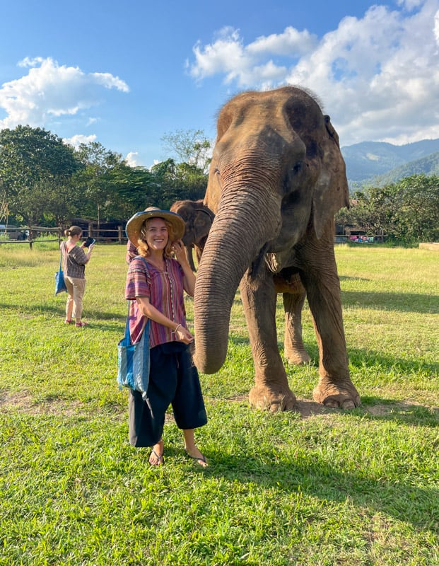 girl with elephants outside of chiang mai