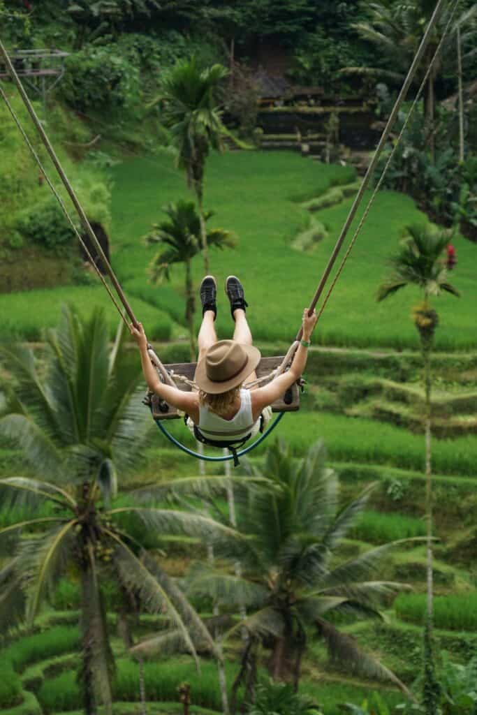lora on swing over rice fields ubud