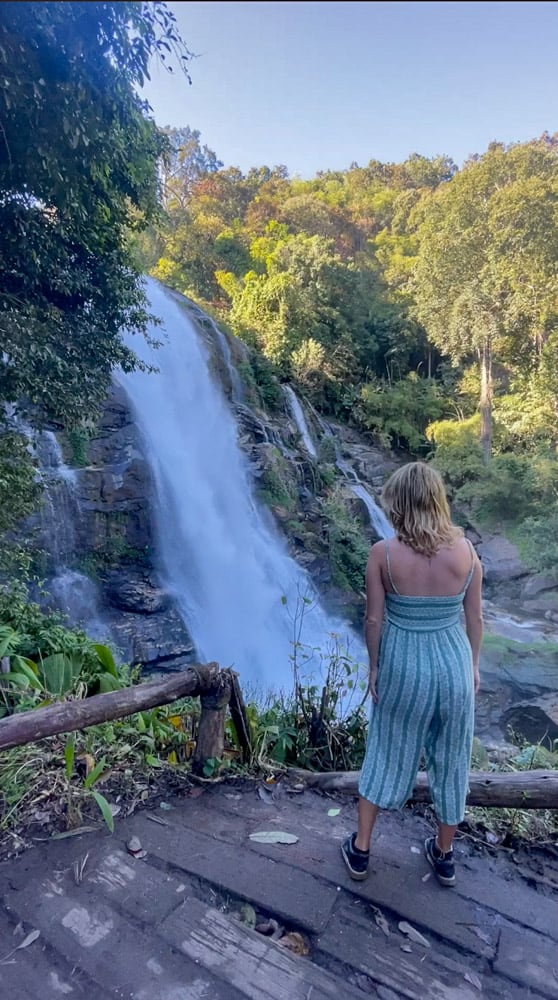lora looking at waterfall in chiang mai best places in asia for digital nomads