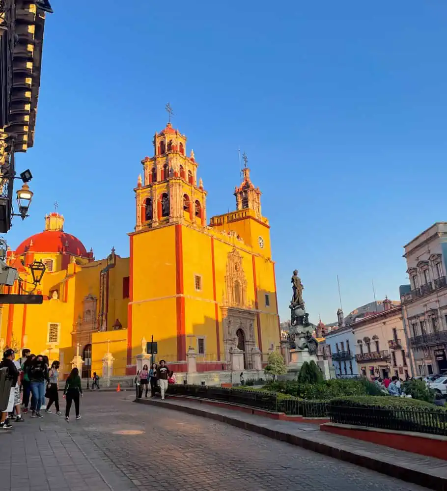 Guanajuato city in mexico with a church in the background at golden hour