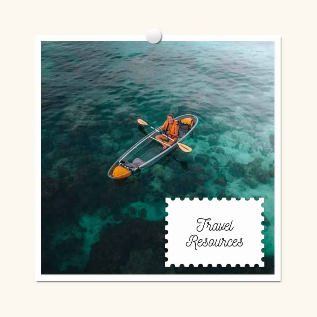 lora in a clear kayak on the waters of thailand. the overlay text reads travel resources.