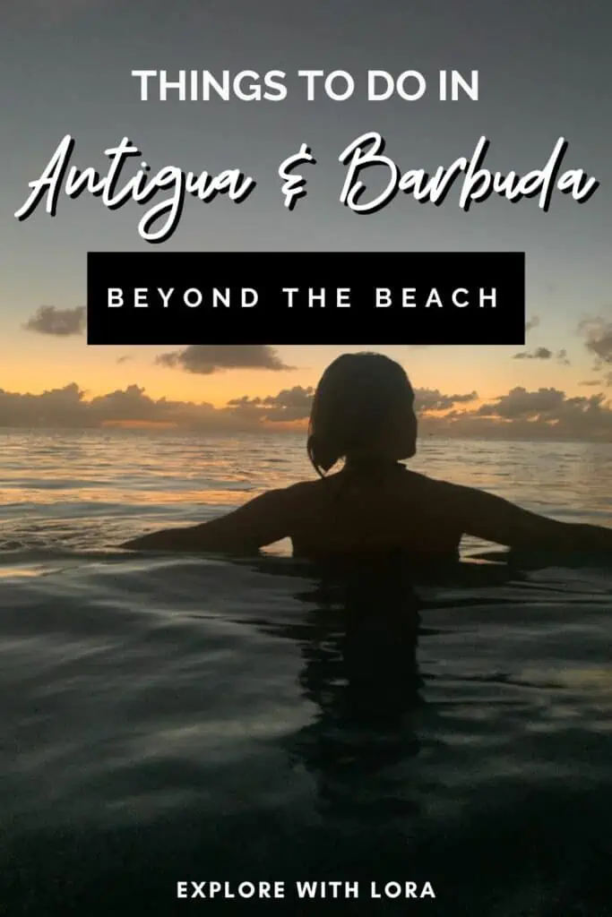 lora in ocean staring at sunset with text overlay that says things to do in antigua and barbuda beyond the beach