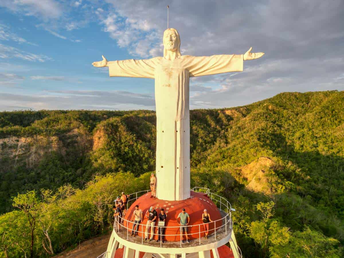 aerial shot of christ the redeemer statue on islas marias mexico
