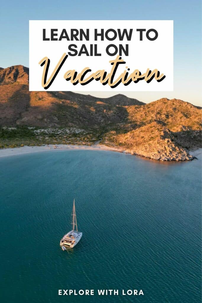 Learn how to sail on vacation with sailing boat and mountain in backdrop