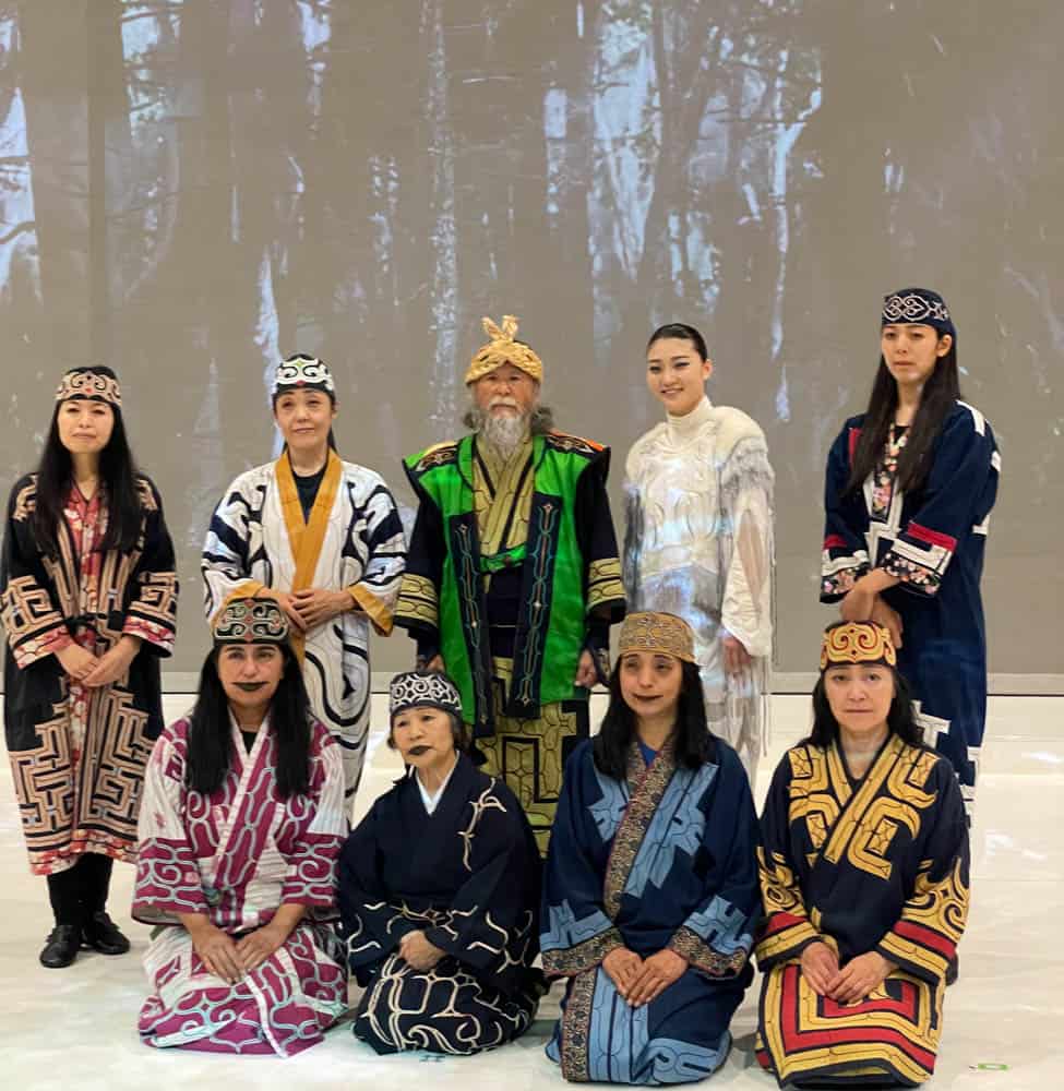 ainu indigious performers posing for a photo