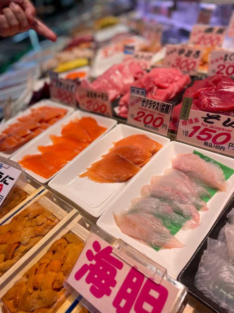 raw seafood line at stalls in a local market in kushiro japan