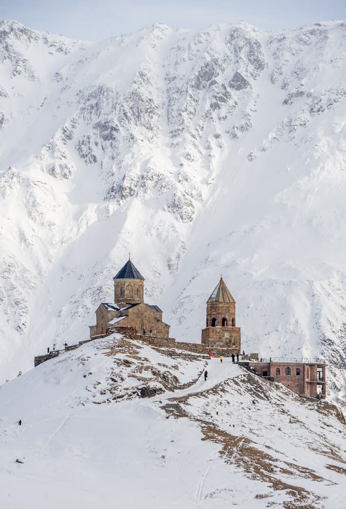 A church on top of a snow covered mountain.